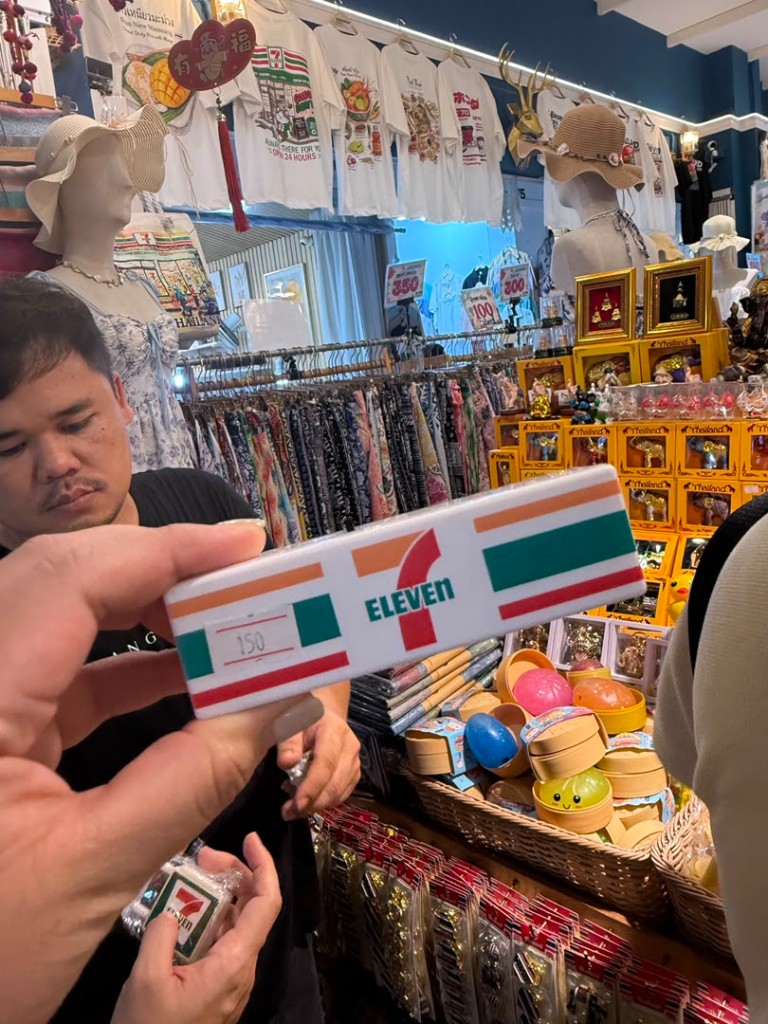 7-Eleven themed souvenirs and t-shirts at a Jodd Fairs stall